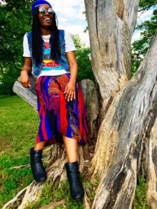 Sleeveless denim jacket with print skirt