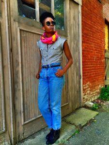 collared shirt and high-waisted jeans